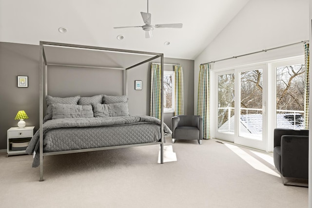 carpeted bedroom with access to exterior, high vaulted ceiling, and a ceiling fan