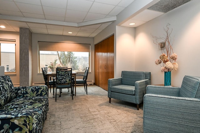 interior space with light colored carpet, visible vents, a drop ceiling, and recessed lighting