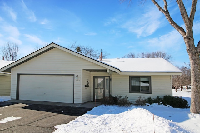 single story home with an attached garage