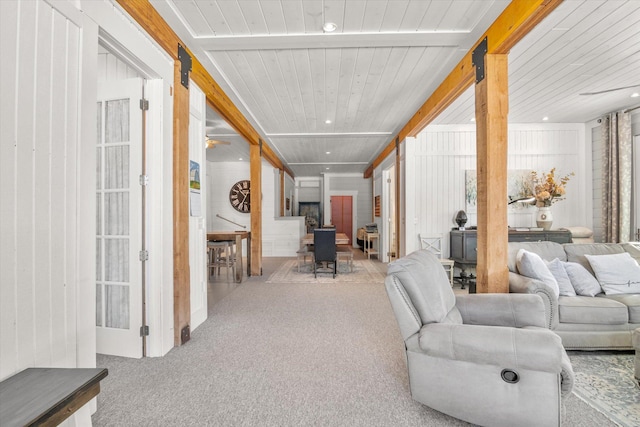 living area featuring carpet, wooden ceiling, and recessed lighting