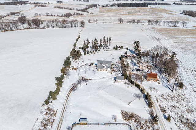 snowy aerial view featuring a rural view