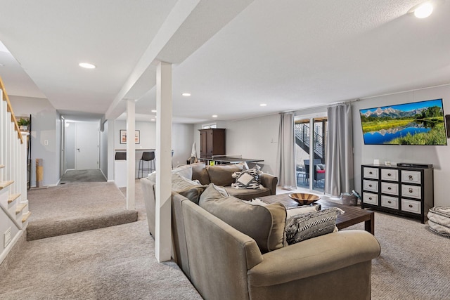 living room with light carpet, stairway, and recessed lighting