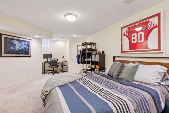 carpeted bedroom featuring baseboards