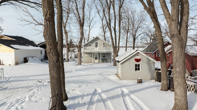 24932 Wall Lake Point Cir, Fergus Falls, MN 56537 - yard layered in snow with an outdoor structure and a balcony