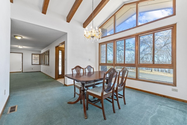 dining area featuring a notable chandelier, visible vents, beamed ceiling, and carpet