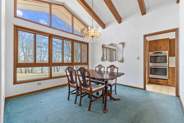 carpeted dining space featuring beamed ceiling, a notable chandelier, plenty of natural light, and high vaulted ceiling