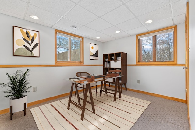 dining area featuring a wealth of natural light, recessed lighting, a paneled ceiling, and baseboards