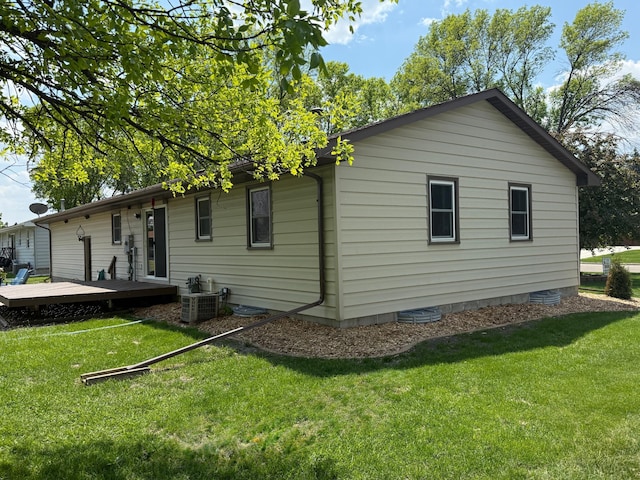 502 19th St N, Benson, MN 56215 - back of house featuring a deck and a yard