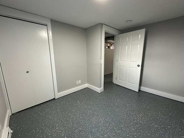 unfurnished bedroom with baseboards