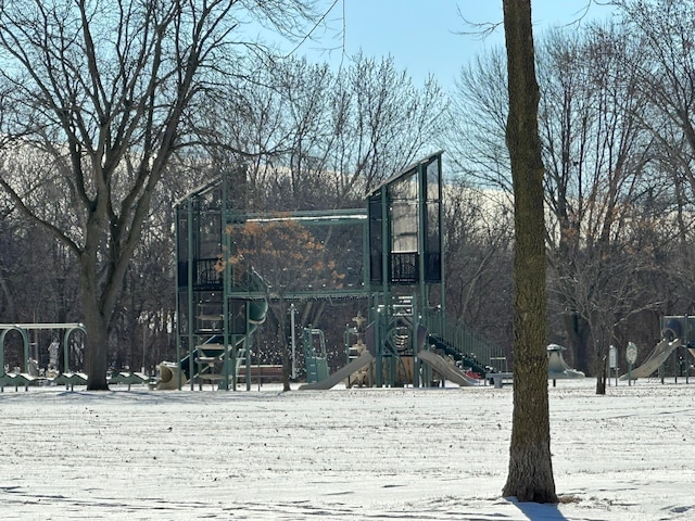 view of property's community featuring playground community