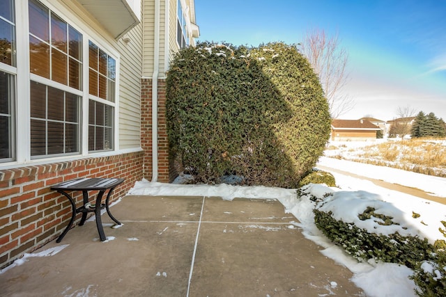 view of snow covered patio