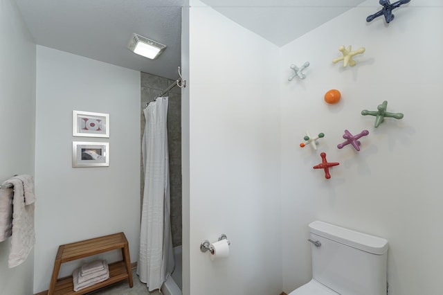 bathroom with visible vents, curtained shower, and toilet