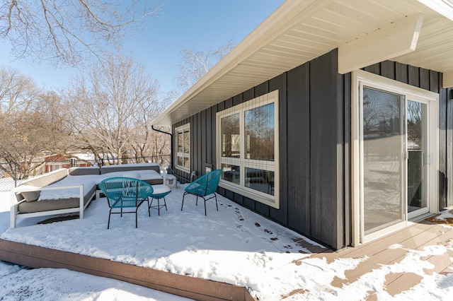 view of snow covered patio