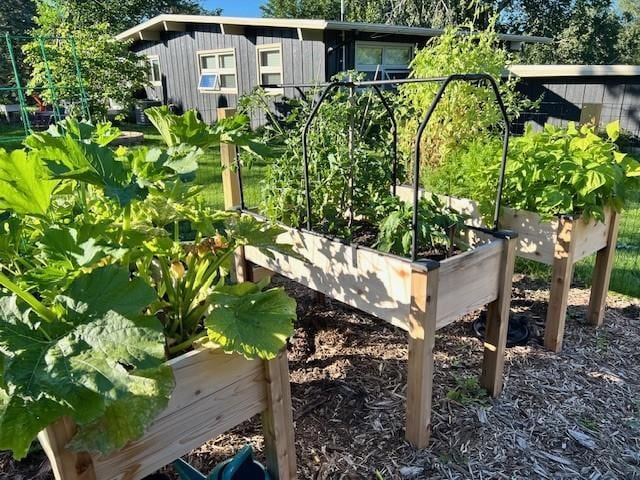 exterior details featuring a garden