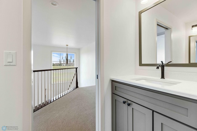 3254 Timber Creek Cir S, Fargo, ND 58104 - bathroom with vanity and a chandelier