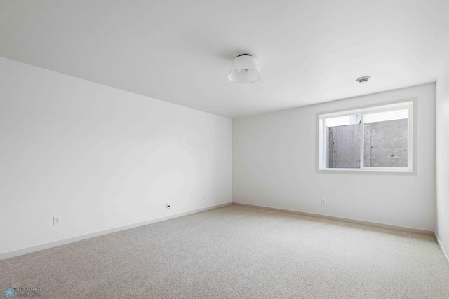 3254 Timber Creek Cir S, Fargo, ND 58104 - carpeted spare room featuring baseboards and a smoke detector