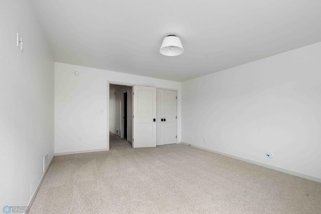 3254 Timber Creek Cir S, Fargo, ND 58104 - unfurnished bedroom with light colored carpet, baseboards, and a closet