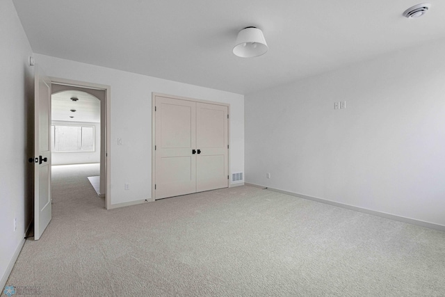 3254 Timber Creek Cir S, Fargo, ND 58104 - unfurnished bedroom featuring baseboards, light carpet, and a closet