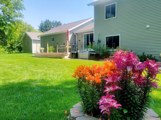 409 Hummingbird Ln, New York Mills, MN 56567 - rear view of property with a lawn