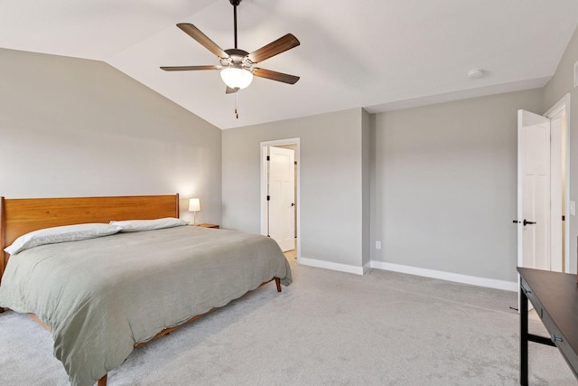 carpeted bedroom with baseboards, a ceiling fan, and lofted ceiling