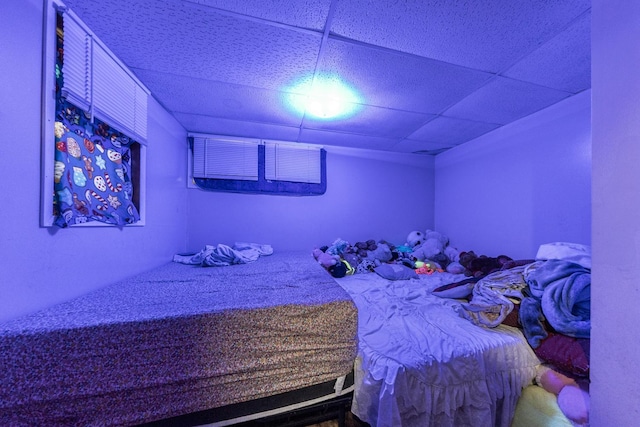 bedroom featuring a drop ceiling