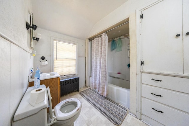 full bathroom featuring toilet, radiator heating unit, shower / bath combo, vaulted ceiling, and vanity