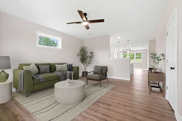 585 Cedar Dr, Lake City, MN 55041 - living area with light wood finished floors and ceiling fan
