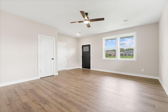 585 Cedar Dr, Lake City, MN 55041 - unfurnished room with wood finished floors and a ceiling fan