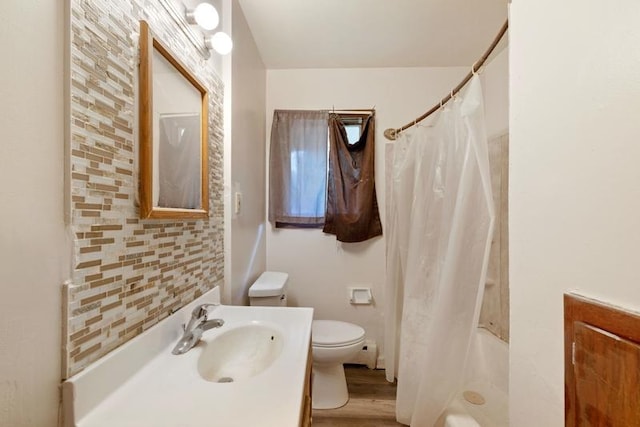 1022-1024 34th Ave N, Minneapolis, MN 55412 - bathroom with toilet, vanity, and wood finished floors
