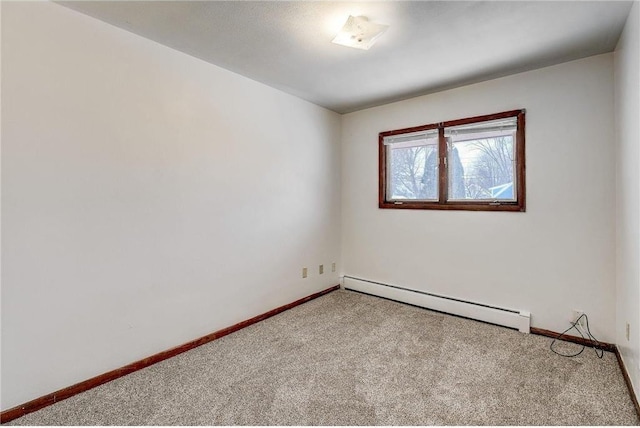 1022-1024 34th Ave N, Minneapolis, MN 55412 - carpeted spare room with a baseboard radiator and baseboards