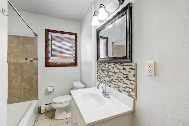 1022-1024 34th Ave N, Minneapolis, MN 55412 - bathroom featuring tile patterned floors, toilet, vanity,  shower combination, and a baseboard heating unit