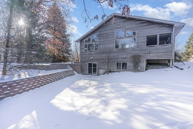 view of snow covered property