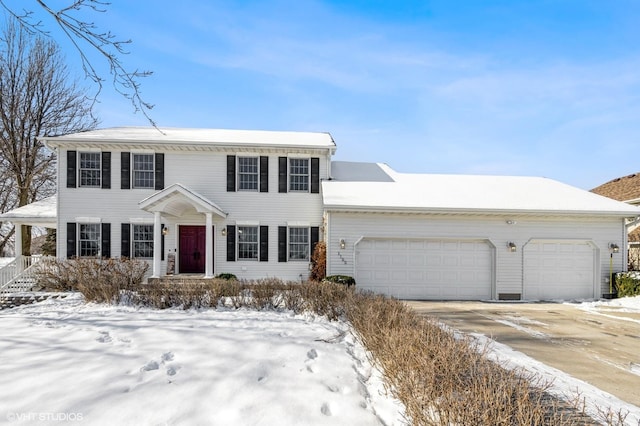 view of front of house featuring a garage and concrete driveway