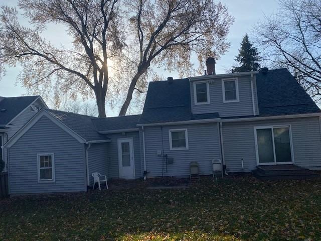 632 Morgan Ave S, Minneapolis, MN 55405 - back of property with a chimney and a yard