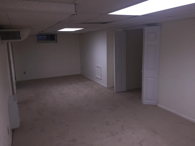 632 Morgan Ave S, Minneapolis, MN 55405 - finished below grade area featuring light carpet, a drop ceiling, and baseboards
