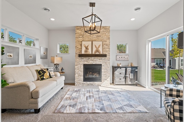living area featuring carpet, a fireplace, visible vents, and recessed lighting