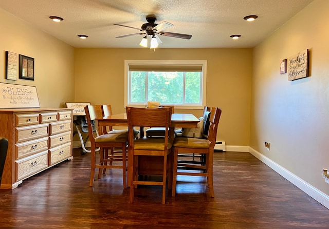 dining space with a textured ceiling, a baseboard radiator, a ceiling fan, baseboards, and dark wood finished floors