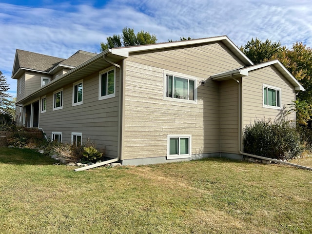 302 Dakota Ave, Hoffman, MN 56339 - view of home's exterior with a lawn
