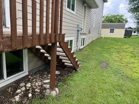302 Dakota Ave, Hoffman, MN 56339 - view of grassy yard with a wooden deck and stairway