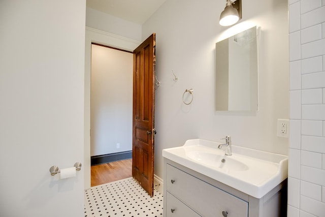 bathroom featuring vanity and baseboards