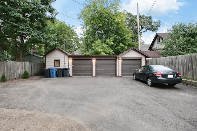 detached garage with fence