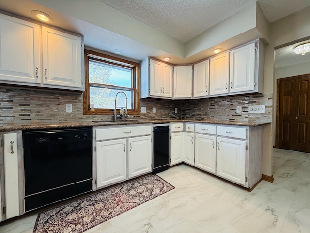 kitchen featuring a sink, white cabinets, marble finish floor, decorative backsplash, and dishwasher