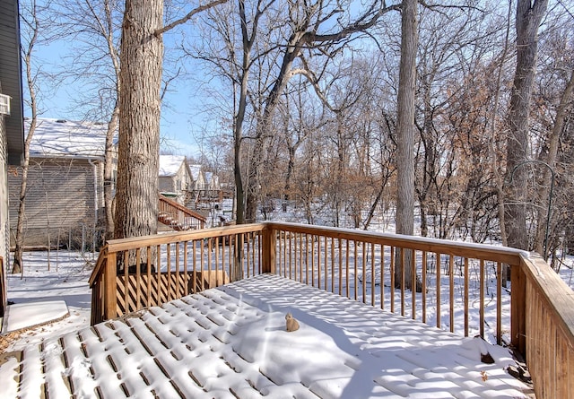 view of snow covered deck