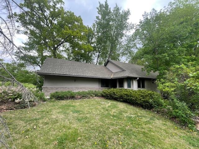 15153 Cates Lake Dr, Prior Lake, MN 55372 - view of front of home with a front lawn and a shingled roof
