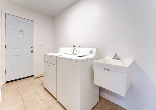 15153 Cates Lake Dr, Prior Lake, MN 55372 - washroom with washer and clothes dryer and light tile patterned floors