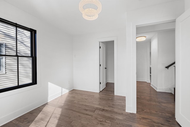 4129 Utica Ave S, Saint Louis Park, MN 55416 - unfurnished room with a chandelier and wood finished floors