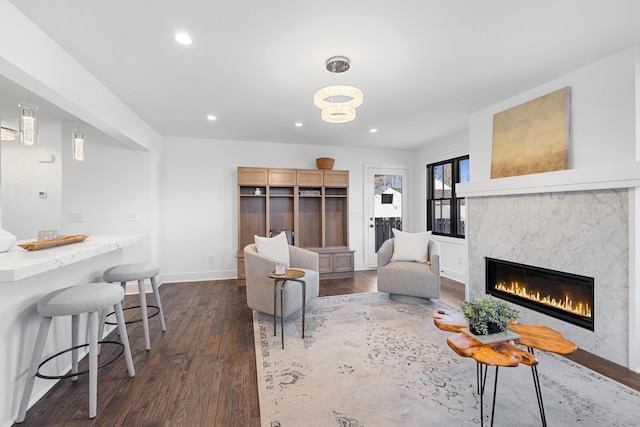 4129 Utica Ave S, Saint Louis Park, MN 55416 - living room featuring dark wood finished floors, a premium fireplace, and recessed lighting