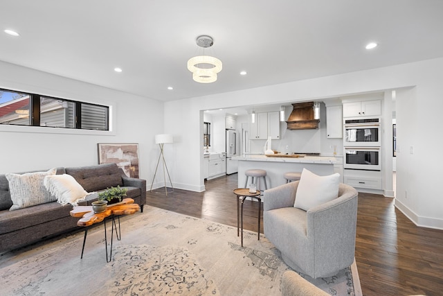 4129 Utica Ave S, Saint Louis Park, MN 55416 - living room featuring dark wood finished floors, recessed lighting, and a chandelier