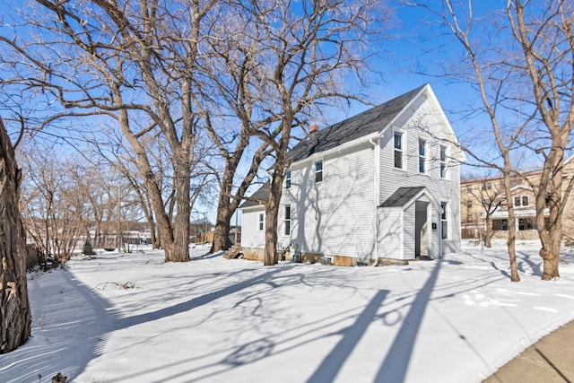 view of snow covered property