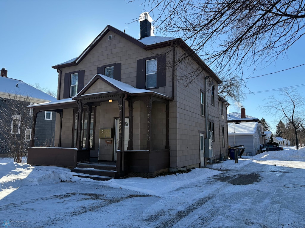 view of front of property with a chimney